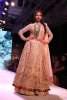 A model walks the ramp in ANMOL Jewellery & outfit by JADE at IIJW2017